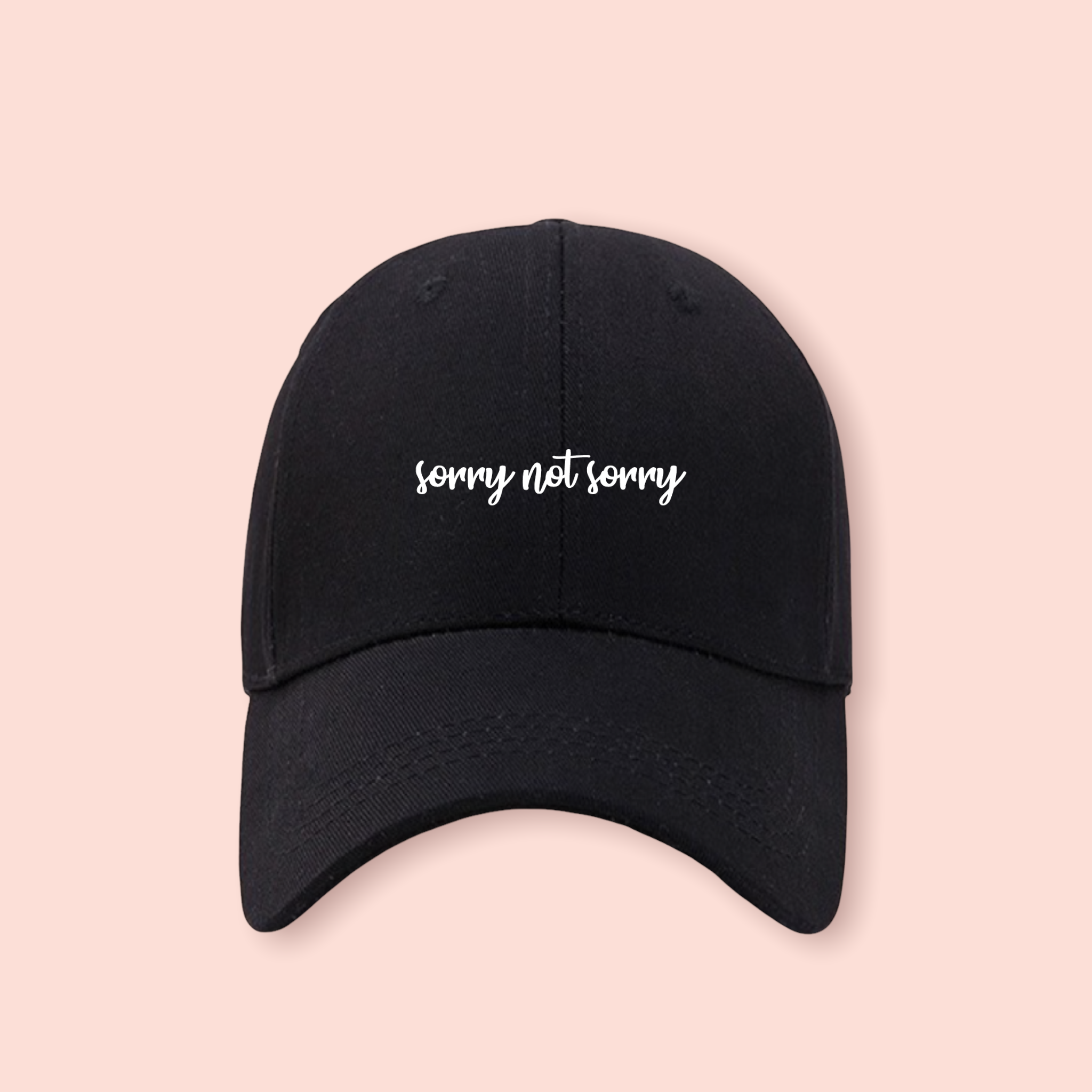 Gorra negra "Sorry not sorry"