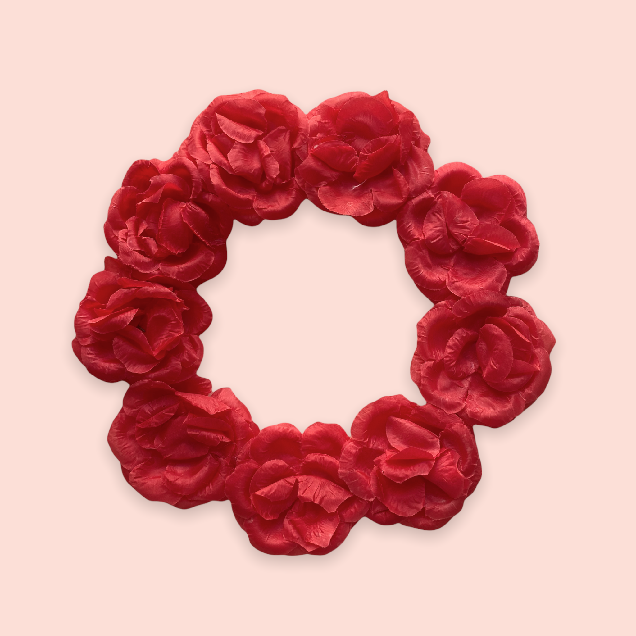 Corona de flores roja